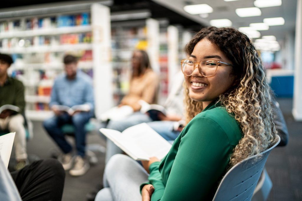 Portrait of a young university student woman at university